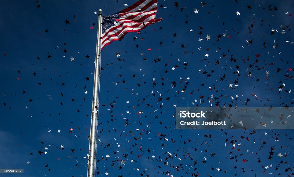 American celebration Confetti flies during Victory Celebration as Milwaukee Speedway.  Blue Stock Photo