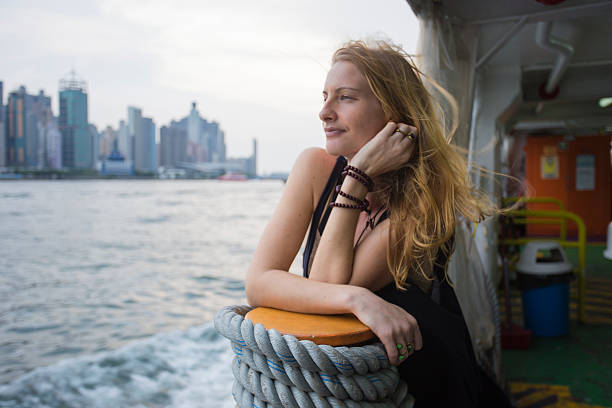 mujer rubia viaja en ferry. - alenka fotografías e imágenes de stock