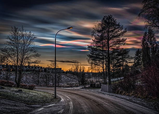 Polar Stratospheric Pearle Scent Clouds over the Street at Sunset