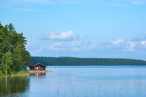 Small sauna cabin in the shore of lake in eastern Finland