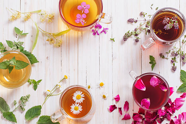 istock herbal tea on a white wooden background 589943678