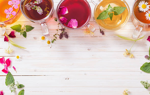 istock herbal tea on a white wooden background 589944922