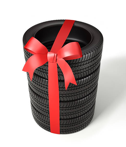 istock the tyres are packaged as a gift, wrapped red ribbon 589945024