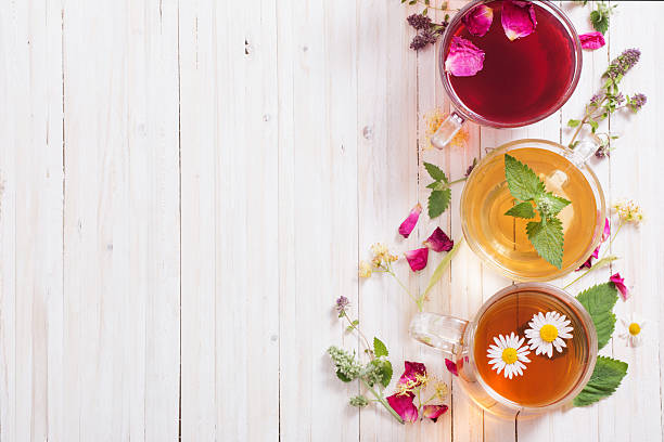 istock herbal tea on a white wooden background 589945466
