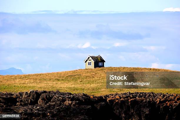 Small House On A Small Island Stock Photo - Download Image Now - House, Loneliness, Iceland