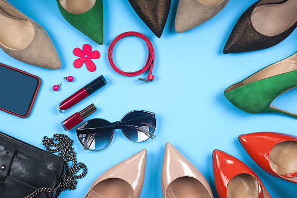 istock Women accessories and shoes on light background. Top view. 589946980
