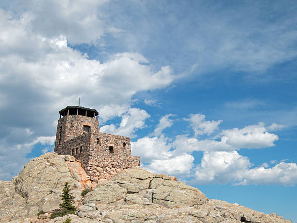 istock Harney Peak Fire Lookout Tower on cloudy day 589947556