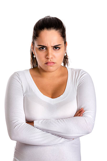 istock Hispanic young woman with angry and serious expression 589949698
