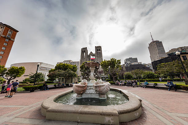 white fountain with black dragon heads