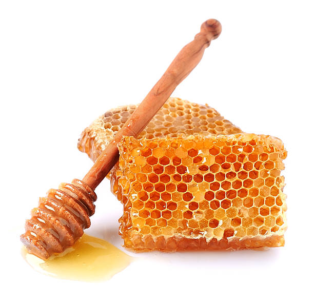 istock Honey dipper with honeycomb 589951648