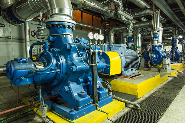 istock several water pumps with large motors 589952066