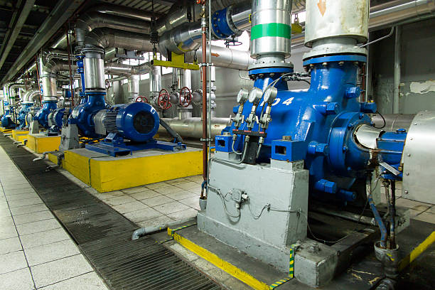 istock several water pumps with large motors 589952162