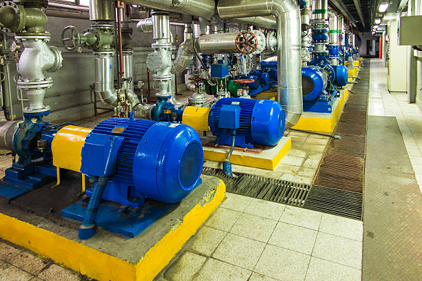 istock several water pumps with large motors 589952242