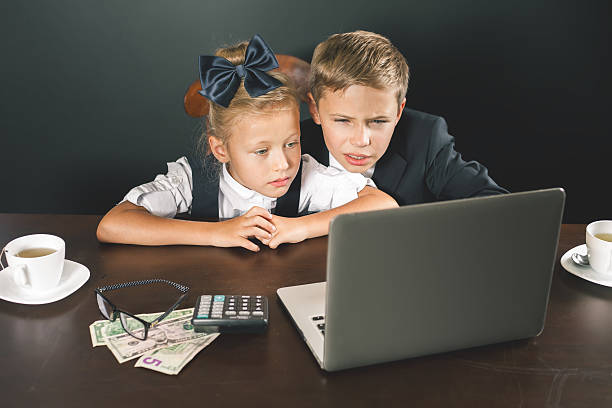 istock Business or school kids uses a laptop computer 589954914