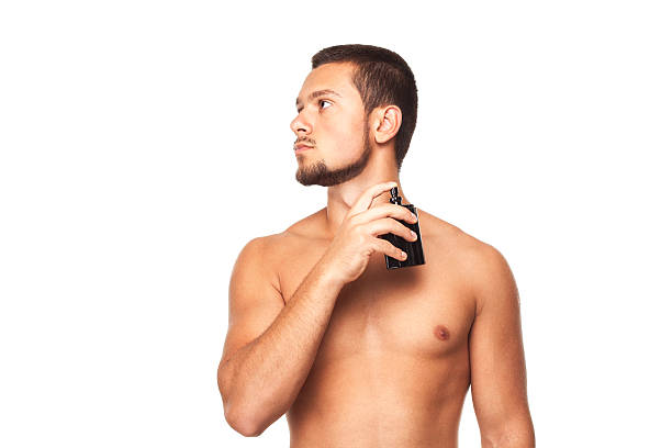 Boy Using Perfume 60+ Boy Bathroom Smell Stock Photos, Pictures & Royalty-Free Images ...