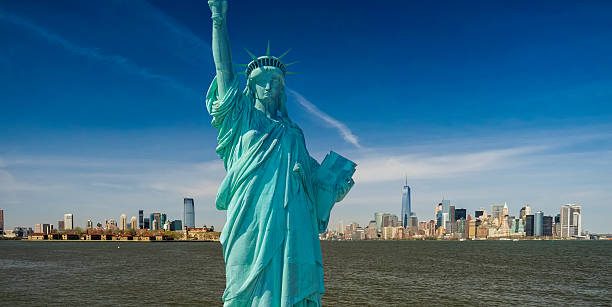 istock Statue of Liberty on a sunny day 589956732