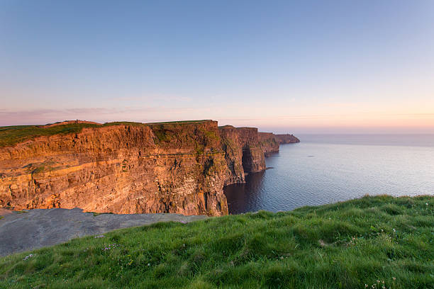 istock Cliffs of Moher at sunset in Co. Clare Ireland 589957196