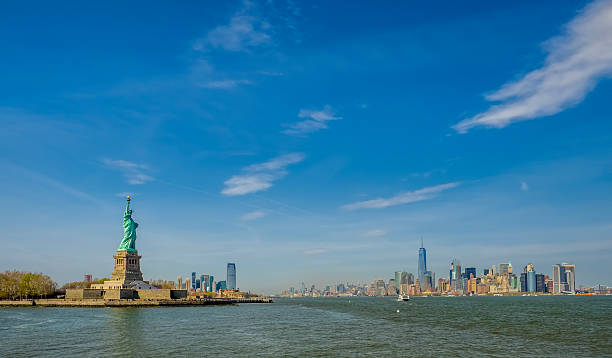istock Statue of Liberty on a sunny day 589957738