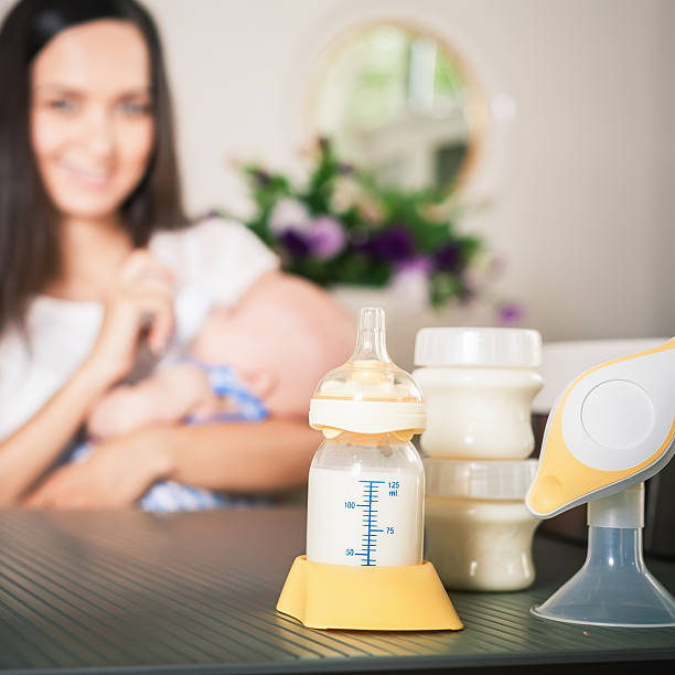 istock Manual breast pump, mothers breast milk 589957762