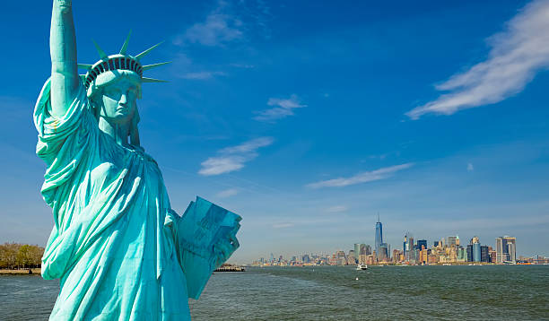istock Statue of Liberty on a sunny day 589957812