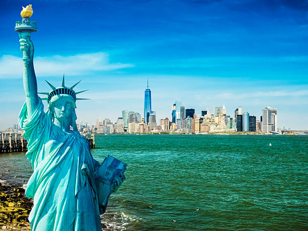 istock Statue of Liberty on a sunny day 589957990