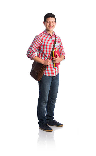 istock Young latin man holding messenger bag and books 589958552
