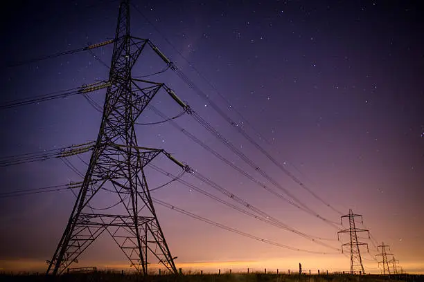 Photo of Electrical Pylons at Night