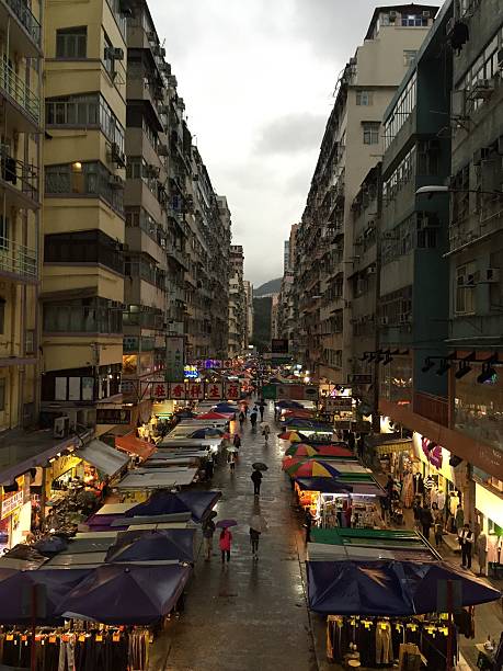 istock Mongkok street on raining day, Hong Kong 589960126