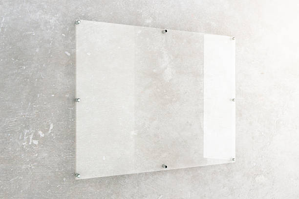 istock Glass plate on concrete wall 589960212