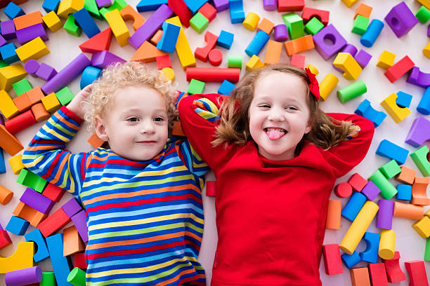 istock Children playing with colorful blocks. 589961286
