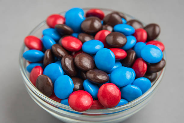 istock Red, Blue, and Brown Chocolate Candies 589963040