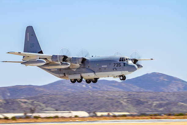 Miramar, USA - October 4, 2014: Miramar, California, USA- October 4, 2014 The US Navy Flight Demonstration Squadron were showing precision flying with their Boeing F/A-18 Hornet aircraft at the 2014 Miramar airshow in California. On this hot day they were many aircraft representing each military branch and displaying their aviation force. On the image we see one of the C-130J Super Hercules built by Lockheed Martin.