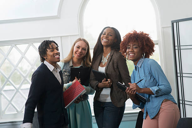 istock Young multi-ethic creative business people meeting 589965880