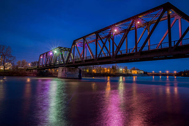 CP Rail Train Bridge CP Rail Train Bridge at Night alberta stock pictures, royalty-free photos & images