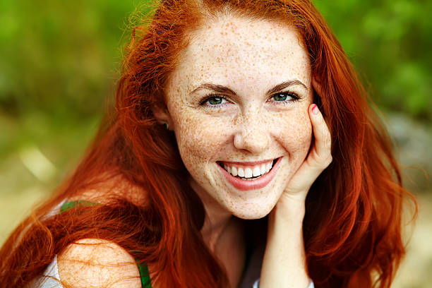 istock beautiful redhead woman 589967552