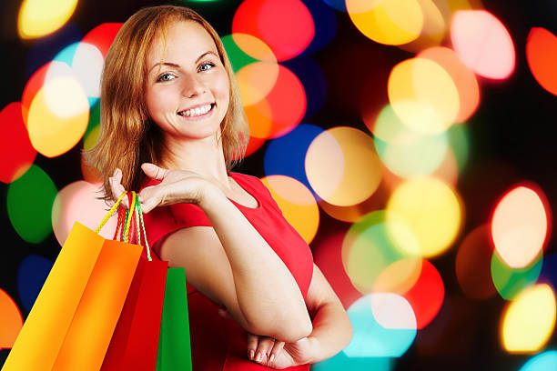 istock Shopping woman holding bags 589967932