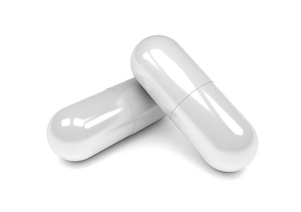 white pill capsule isolated on white background.