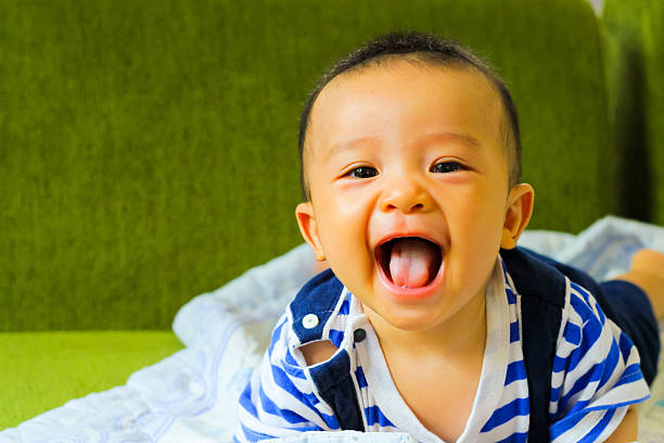 Little baby boy,portrait of adorable curious smile baby boy stock photo