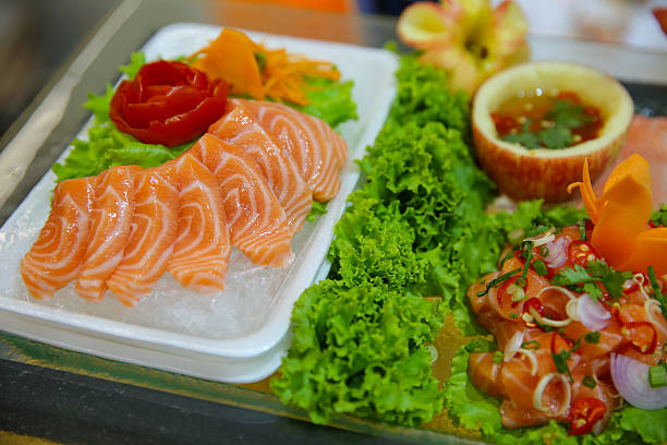 istock fresh Salmon and vegetable salad  isolated 589969318
