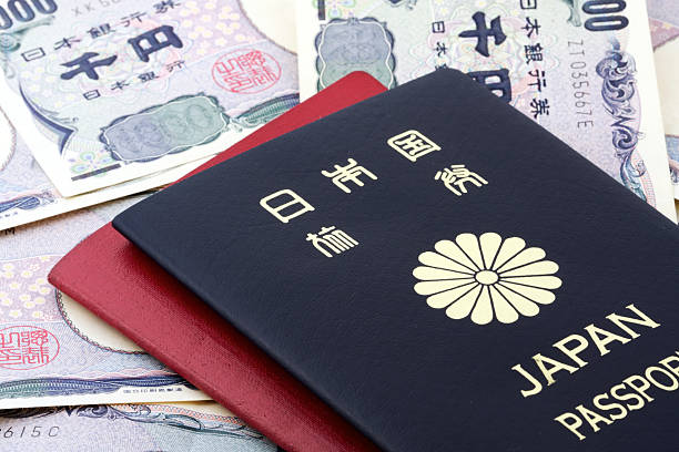 istock Japanese passports on currency 589971292