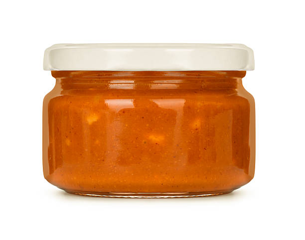 istock Jar of peanut butter isolated on a white 589971770