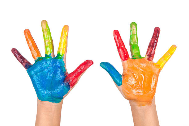 istock Painted colorful hands of kid on white background 589971828