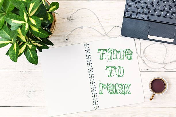 istock Cup of tea in morning. Text in Notepad 589971974