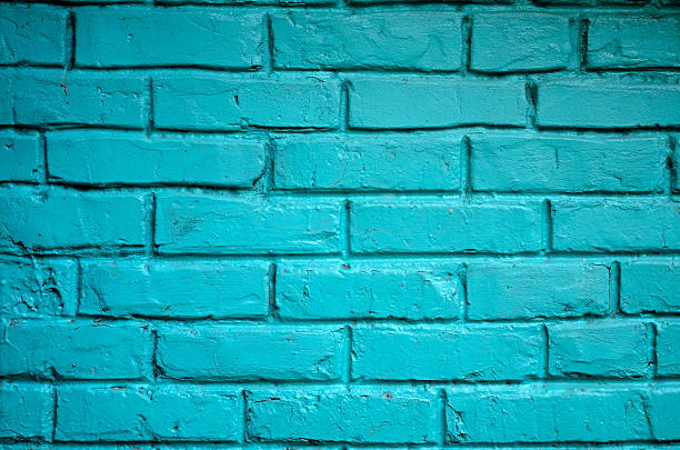 istock Texture of old blue brick wall surface with cement 589975890