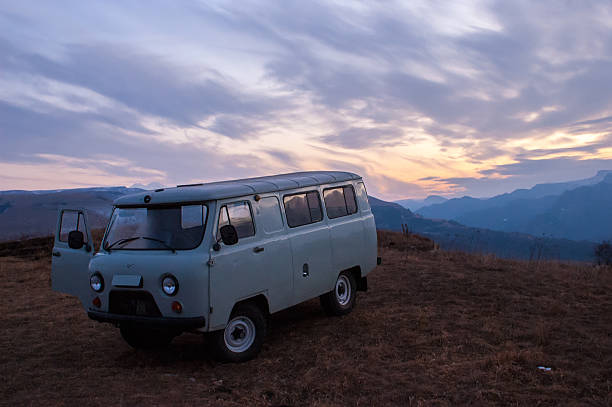 istock UAZ 452 in front of ridge peaks 589977554