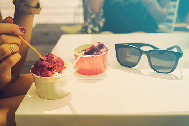 Attractive woman eating ice cream.