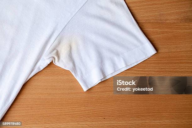 Shirts Dirty Caused By Roll On Deodorant Stock Photo - Download Image Now - Stained, Yellow, Armpit