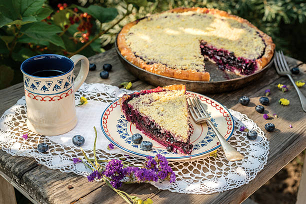 istock Bilberry pie. A large piece of bilberry pie on a 589979274