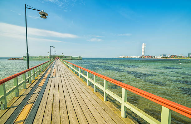 istock Wooden pier and bathhouse in Malmo 589979936