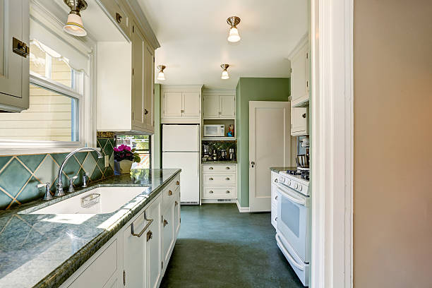 istock Classic American kitchen room interior in green and white tones 589981254